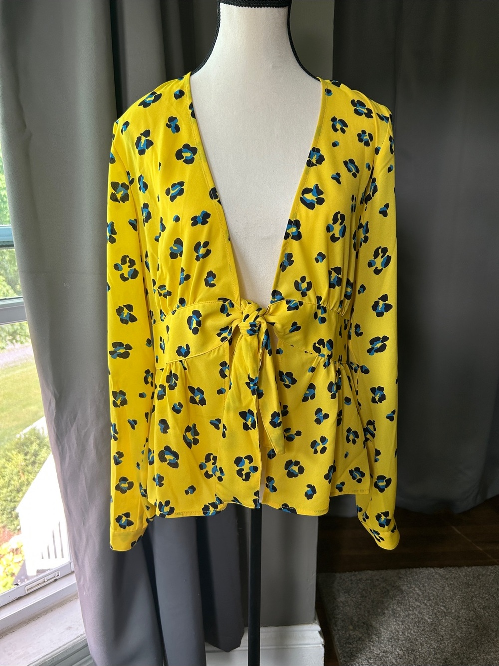 CAbi Yellow Floral Tie-Front Blouse with Blue and Black Accents